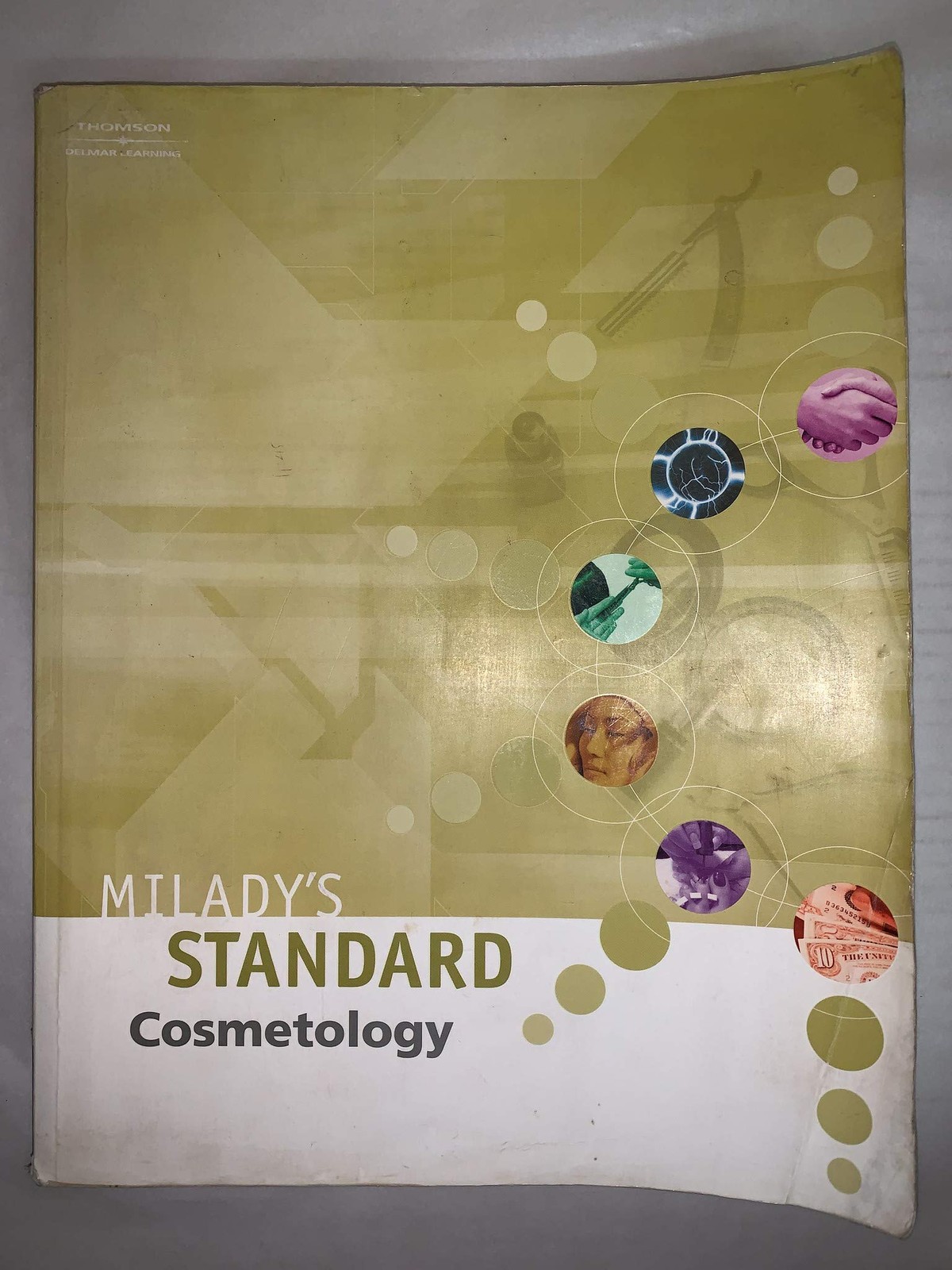 Milady’s Standard Cosmetology 2004 by Milady (2002) Paperback