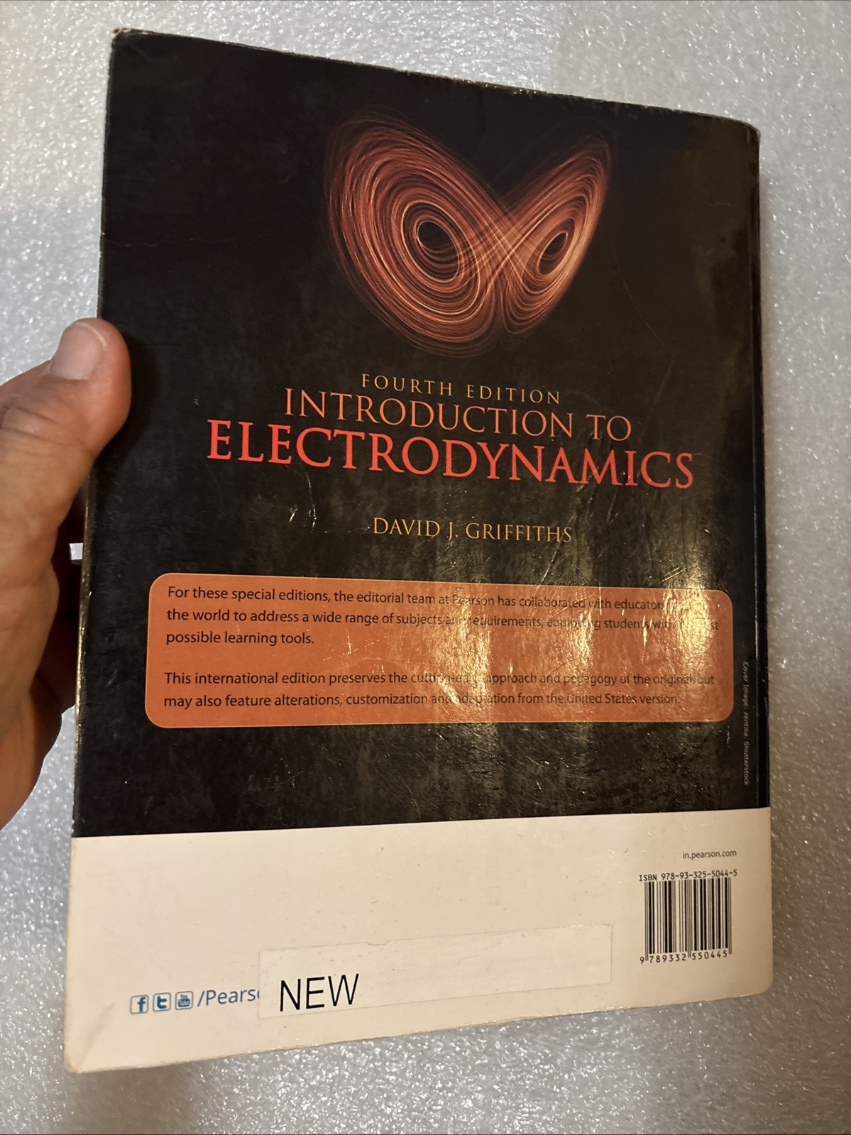 Introduction to Electrodynamics Book David Griffiths 4th Edition (has writing)